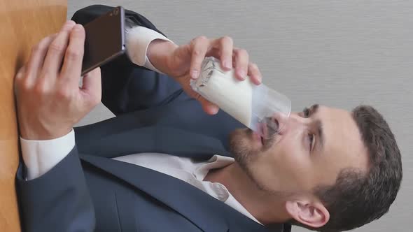 Vertical Video of Man with Milk