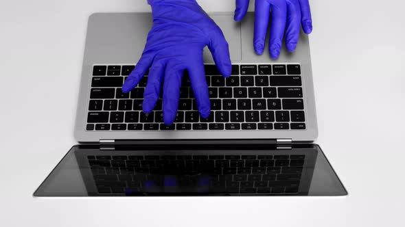 Using laptop computer with medical gloves