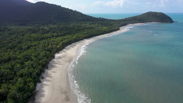 Cape Tribulation in Daintree Rainforest aerial of sunny beach and turquoise water, Queensland, Austr alt