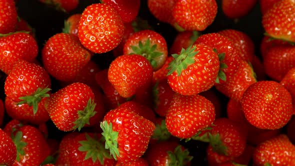 Super Slow Motion Shot of Strawberries Explosion Towards Camera at 1000Fps. alt