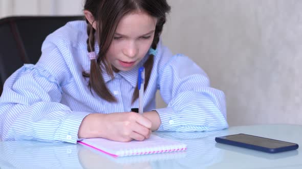 Young Girl Learn By Tablet at Home