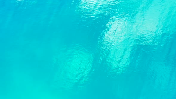 Wide aerial island view of a summer white paradise sand beach and aqua turquoise water background in alt