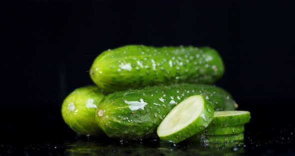 Fresh Cucumbers Under Water Drops alt