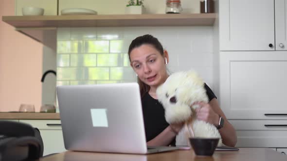 Young Woman Working As Online Nanny From Home. Online Education for Children at Home alt