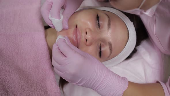 Top View of the Face of a Beautiful Woman Who Is Doing a Cosmetic Procedure
