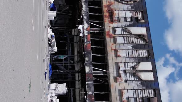 Vertical Video of a Burnt Shopping Center During the War in Bucha Ukraine alt