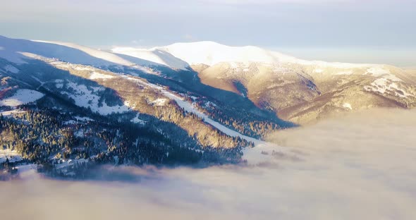 Aerial Shot of Majestic Sunrise in the Mountains alt