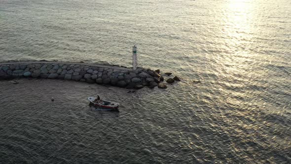 Breakwater And Boat Aerial View