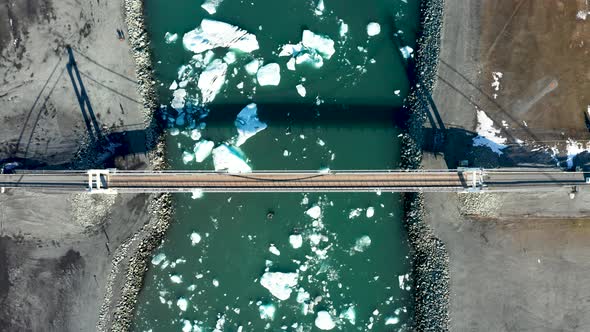 Aerial View of the Bridge, Glacial Lagoon and Icebergs, Iceland in Early Spring
