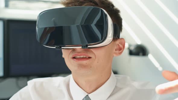 Happy Man Using Virtual Reality Headset