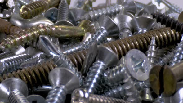 Old And New Screws Close Up alt