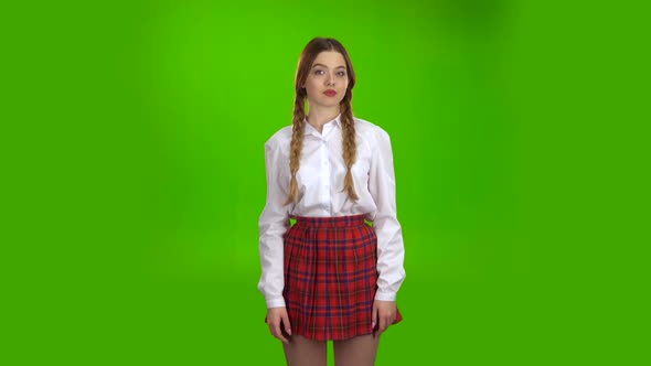 Teen Shows a Ok Smiling . Green Screen alt