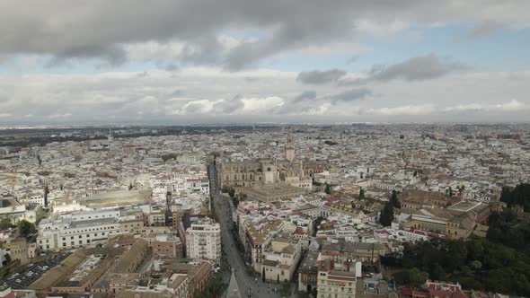 Slowy pullback Seville Cityscape panorama view, Cloudy day, Andalusia