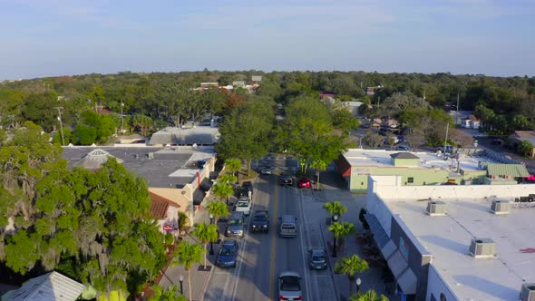 Forward Aerial Pan of the Main Road in a Small Town in Florida alt