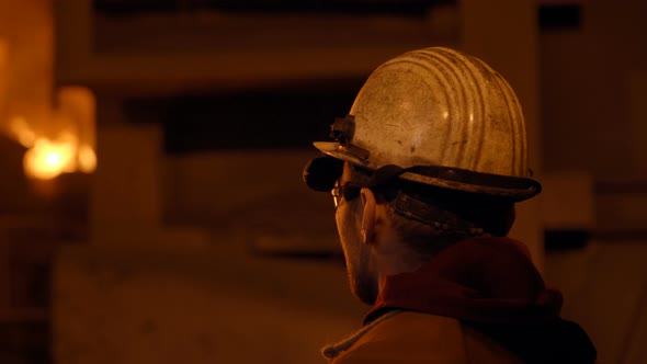 Metallurgist at Work By the Blast Furnance, Iron and Steel Works alt