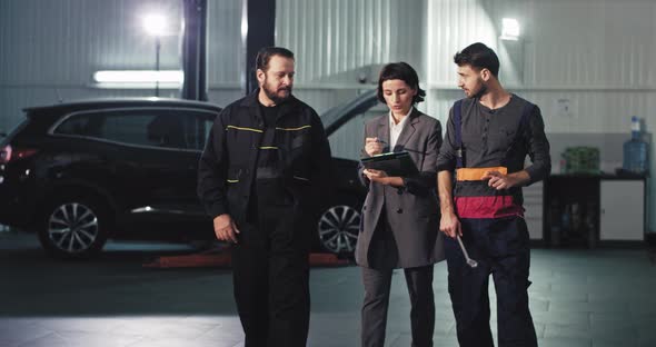 In Front of the Camera Auto Service Team Woman alt