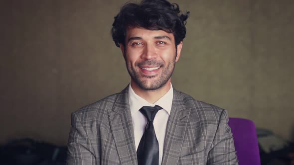 A Middleaged Man Looking at the Camera alt