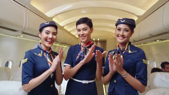 Cabin Crew Clapping Hands in Airplane by DigineeringCreations | VideoHive