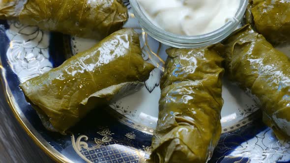 Delicious Dolma with the Cream Sauce on a Asian Plate