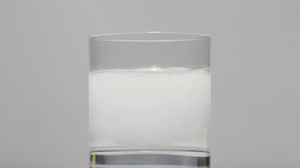 Tablet Fizzes In Glass Of Water alt