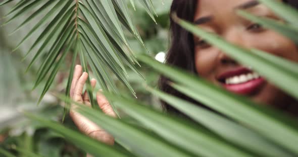 Face of Young Girl with Clean Smooth Skin and Small Branch in Hands alt