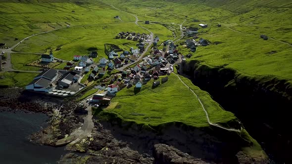 Aerial View of a Canyon in Gjogv Village in Faroe Islands alt