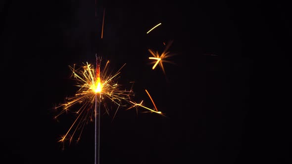 Fireworks Sparkler Close-up on a Black Background