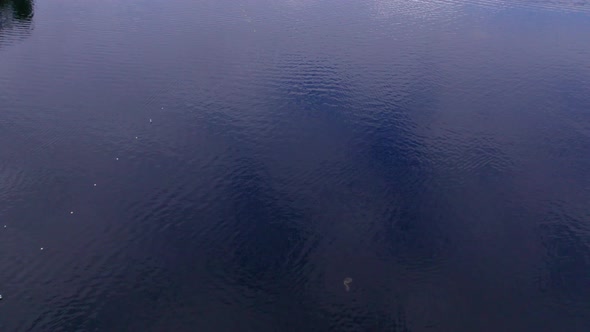 smooth aerial footage of the ancient Trakai castle on the island alt