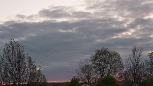 Timelapse of clouds at dusk