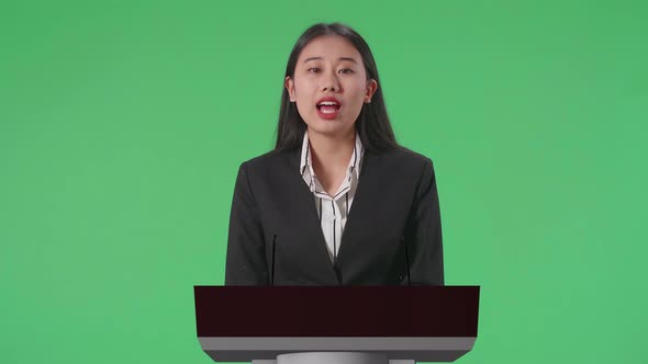 Woman Of Organization Representative Speaking At A Press Conference In Government With Green Screen alt