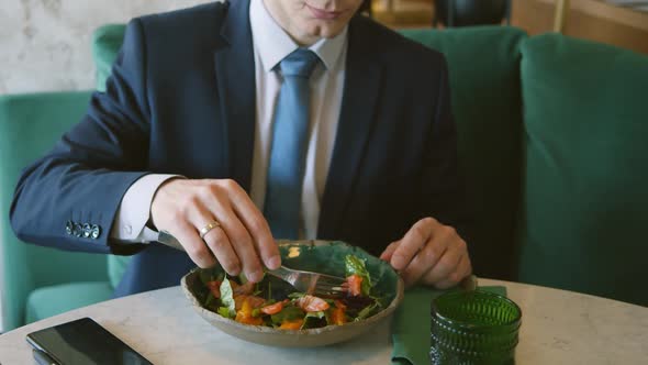 Business Man Getting Meal on Plate at Restaurant alt