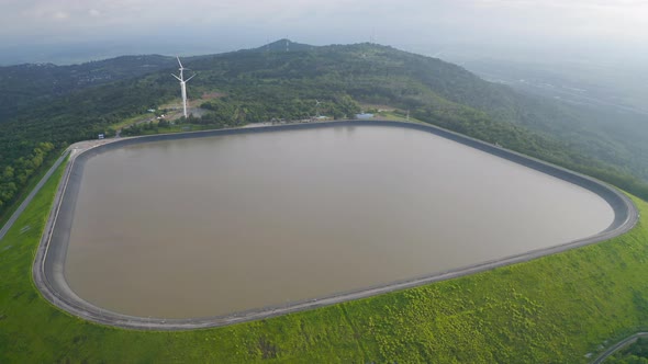 Aerial view of Lam Takhong Dam, Korat, Thailand. Reservoir dam and water in recycle energy alt