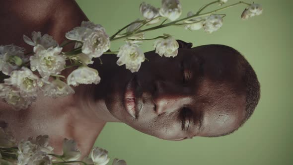 Shirtless Man With Flowers alt