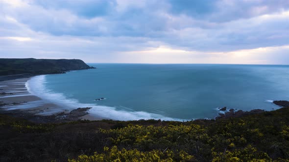 La Hague France Timelapse  Wide Angle View of the Baie d Ecalgrain in Auderville at Dusk alt