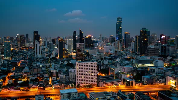 Time Lapse Night Cityscape and Highrise Buildings in Metropolis City Center alt