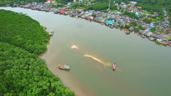 Aerial view over the harbor and fishing villages alt