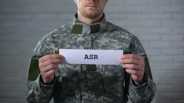ASR Written on Sign in Hands of Soldier, Acute Stress Reaction, Health Problem alt