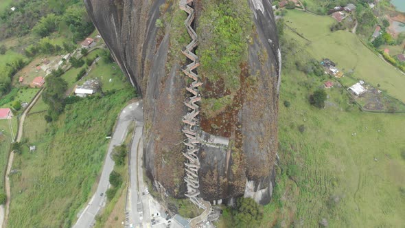 View of The Rock El Penol near the town of Guatape, Antioquia in Colombia - aerial drone shot alt