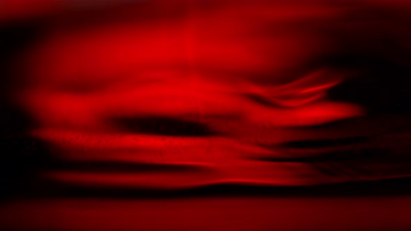Super Slow Motion Macro Abstract Shot of Swirling Red Wine in Glass at 1000Fps alt
