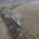Aerial View of the Train Rides on the Railroad - VideoHive Item for Sale
