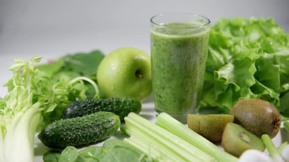 A Glass of Fresh Healthy Celery Green Apple Cucumber and Kiwi Smoothie