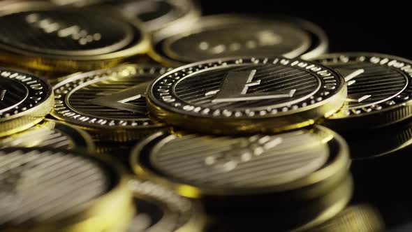 Rotating shot of Bitcoins (digital cryptocurrency) - LITECOIN alt