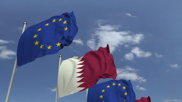 Row of Waving Flags of Qatar and the European Union alt