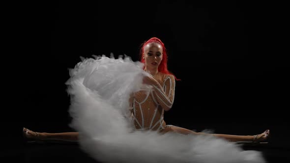 Wide Shot Portrait of Confident Beautiful Woman in Split Bending Shaking White Skirt Looking at alt