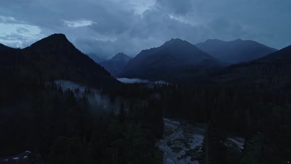 Mountain evening landscape shrouded in the fog. Jaworzyna, Slovakia alt