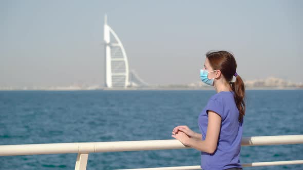 Girl in Medical Mask with Seaview