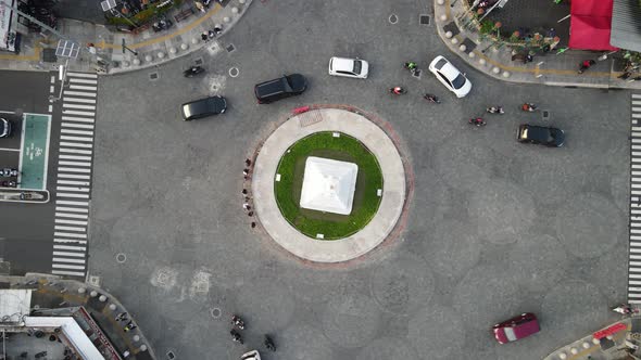 Top aerial view of Tugu Yogyakarta Landmark with busy traffic. alt