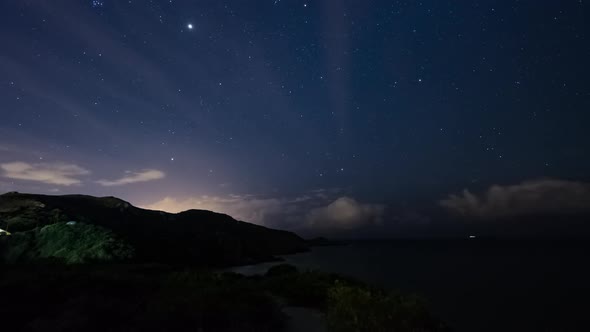 Starry night in the shore Time Lapse