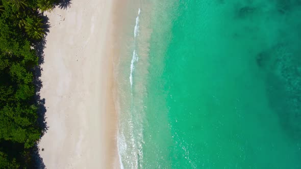 Aerial view beautiful closeup shot beach and seawater on crystal water wave alt