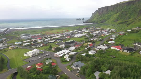 Vik, Iceland skyline with drone video moving forward. alt